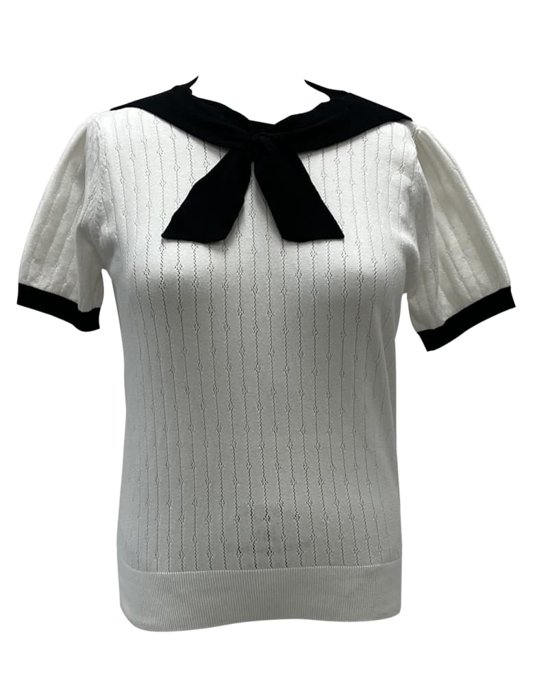 Front of a size 4X|5X Unique Vintage Ivory & Black Neck Tie Park City Sweater in White by Unique Vintage. | dia_product_style_image_id:299022